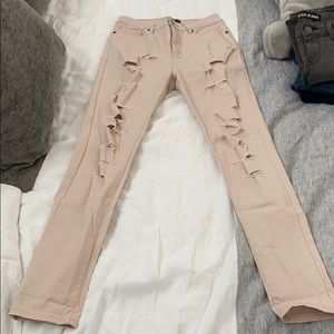 Light pink ripped jeans